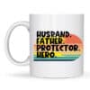 A white mug featuring the Husband Father Hero Custom Design with a retro sunset graphic and bold black text: Husband. Father. Protector. Hero.