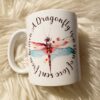 The Dragonfly love from heaven mug features a colorful dragonfly and the phrase A dragonfly is a sign of love sent from heaven in a circular pattern—perfect for anyone who believes in the magic of dragonflies.