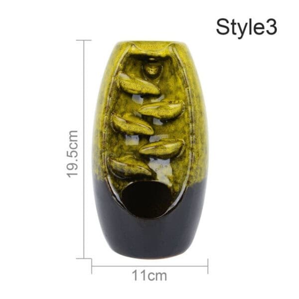 Waterfall Backflow Incense Burner with 10 incense cones, ceramic tabletop design in green and black glaze. Measures 19.5 cm tall by 11 cm wide and features cascading leaf water flow. Style3 indicated in the top right corner.