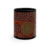 The Aboriginal Dot Art Printed Mug features a vibrant dot painting with concentric circles and patterns in blue, green, yellow, orange, and red on a black background.
