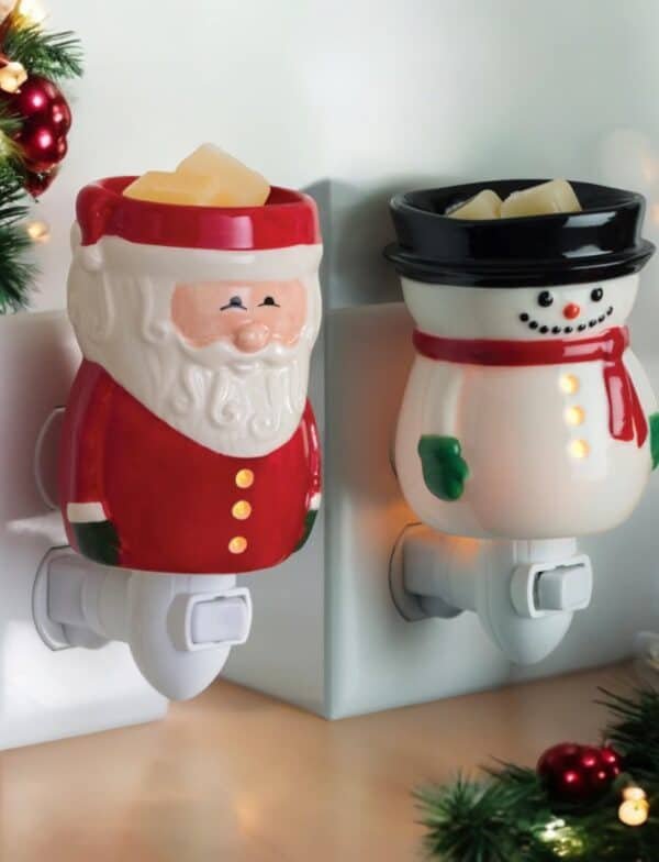 The Santa or Frosty Plugin Wax Warmers melt wax cubes in a wall outlet, adding festive charm to your space with Christmas decorations and garland.