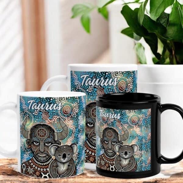 Three Taurus Horned Man with Koala Aboriginal Art Mugs, each featuring a bull and koala design in koala Aboriginal art style with Taurus written above, displayed on a wooden surface next to a green potted plant.