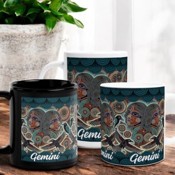 Gemini Aboriginal Astrology Twin Males with Crows Mugs The Gemini Aboriginal Astrology Twin Males with Crows Mugs set includes two white and one black mug, each with stylized Twin Males’ faces, decorative patterns, “Gemini” at the bottom, and a green plant in the background.