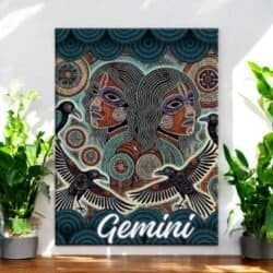The Gemini Men with Crows Aboriginal Zodiac Dot Art Canvas features two masked men back-to-back, surrounded by patterns and black birds, with Gemini below. Inspired by Aboriginal zodiac motifs, it brightens any room among green plants.