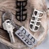Dad custom keyring. Personalised with up to 12 names on a solid or laser cut tag, in silver or black