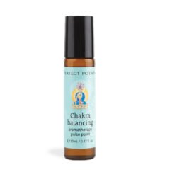 A small brown glass bottle with a black cap, labeled Chakra Balancing Roll On Perfume, 10ml. The label shows a meditating figure with colorful chakras, highlighting its purpose for holistic chakra balancing.