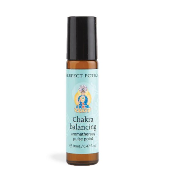 A small brown glass bottle with a black cap, labeled Chakra Balancing Roll On Perfume, 10ml. The label shows a meditating figure with colorful chakras, highlighting its purpose for holistic chakra balancing.