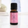 Connection Crown Chakra Essential Oil Blend – Spiritual Alignment & Higher Consciousness A small brown glass bottle with a black cap and pink label reading Connection Crown Chakra Essential Oil Blend – Spiritual Alignment & Higher Consciousness, 10ml, rests against a softly blurred background.